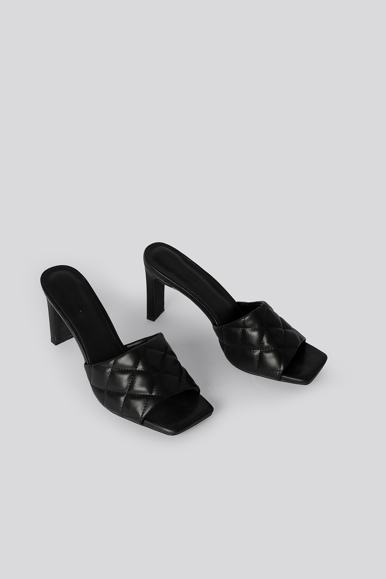 dune quilted mules