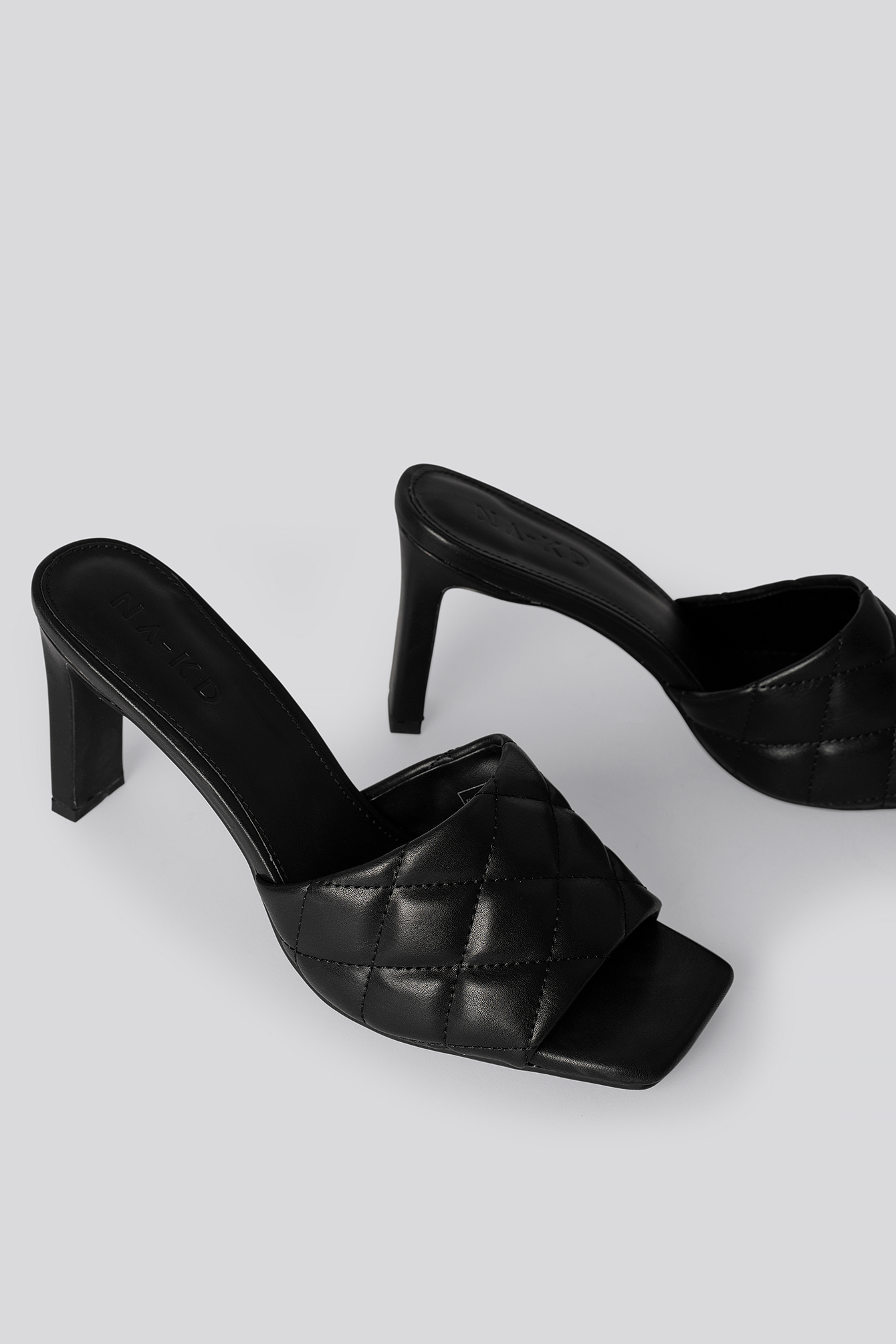 dune quilted mules