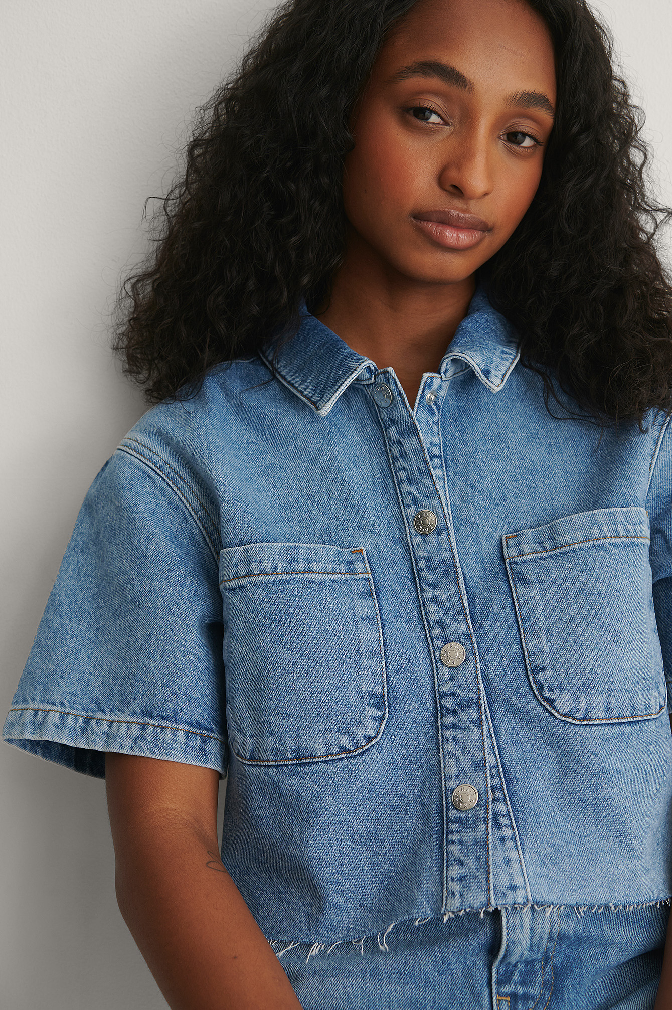 light blue cropped jean jacket
