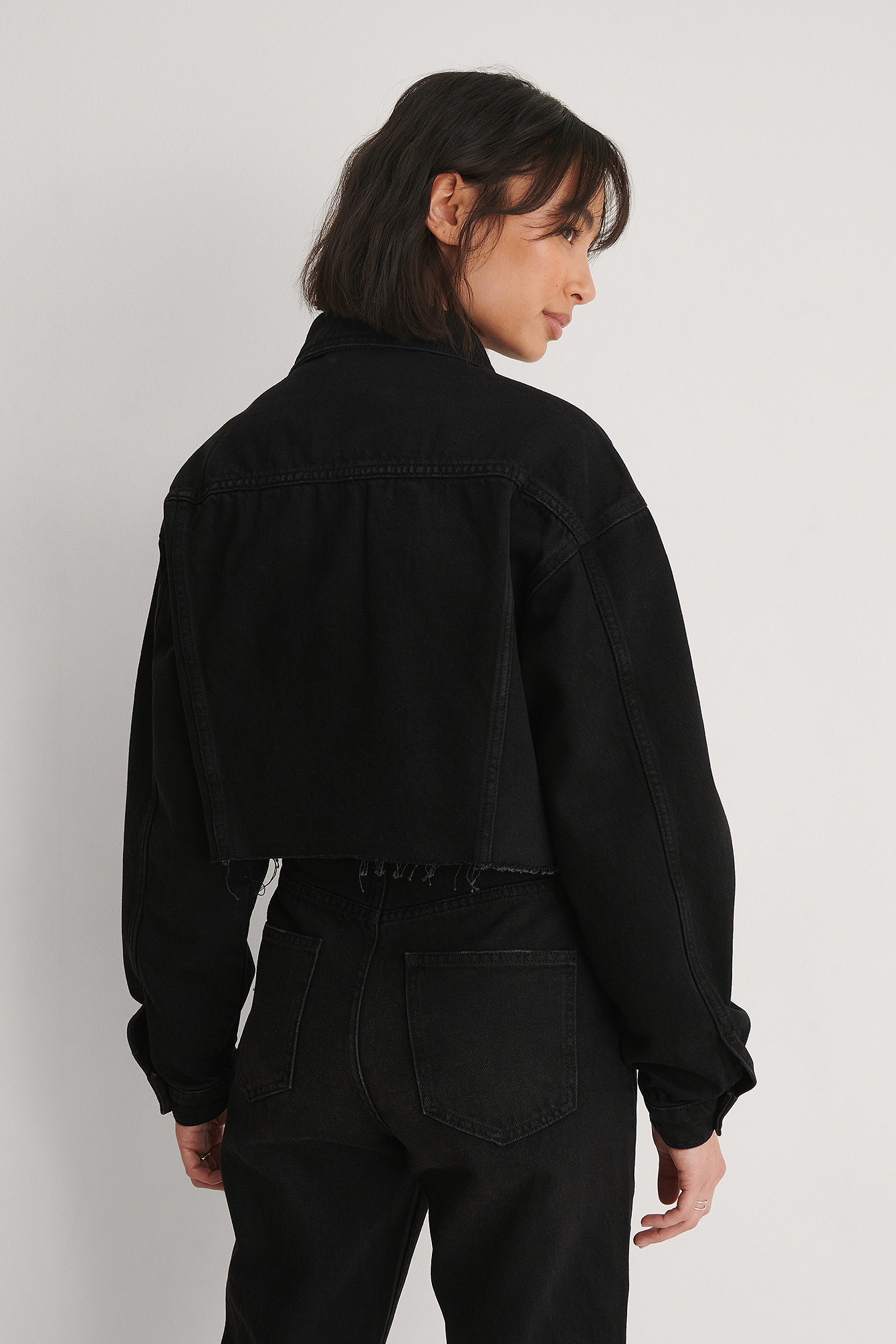 raw hem black denim jacket