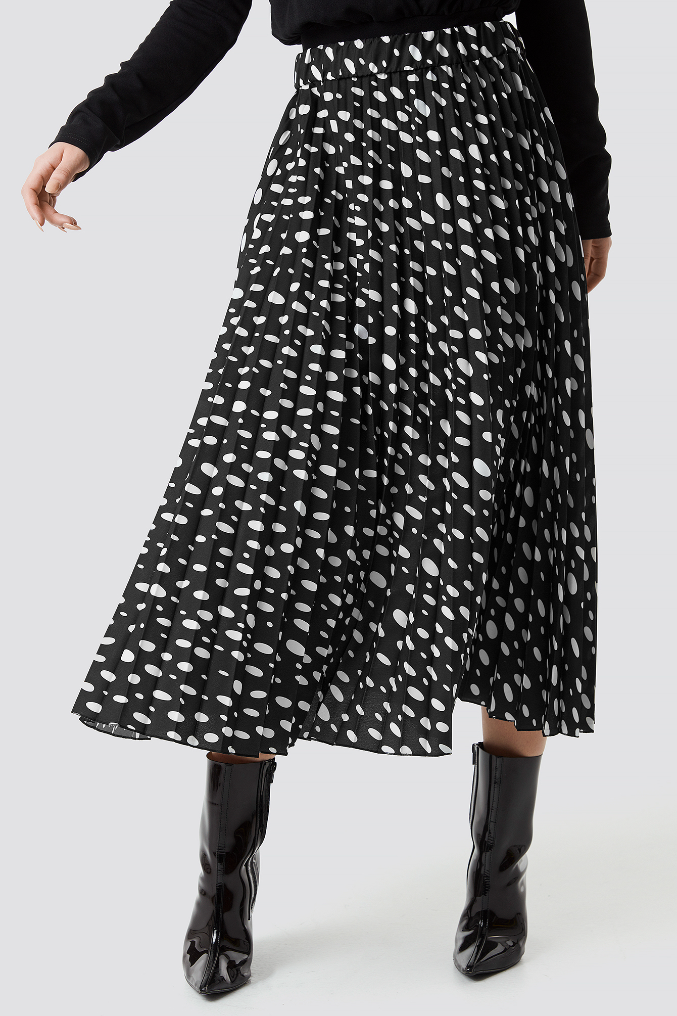 white midi skirt with black dots
