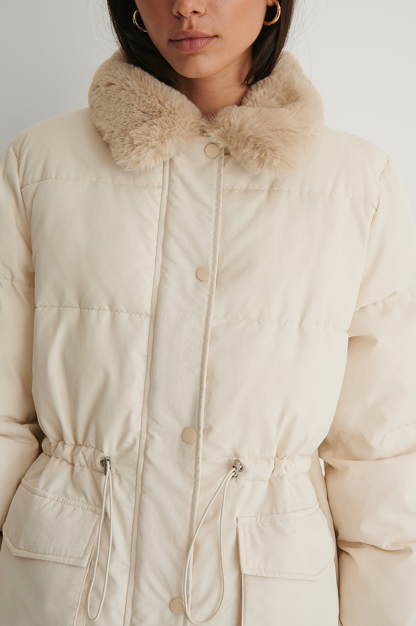 beige faux fur jacket