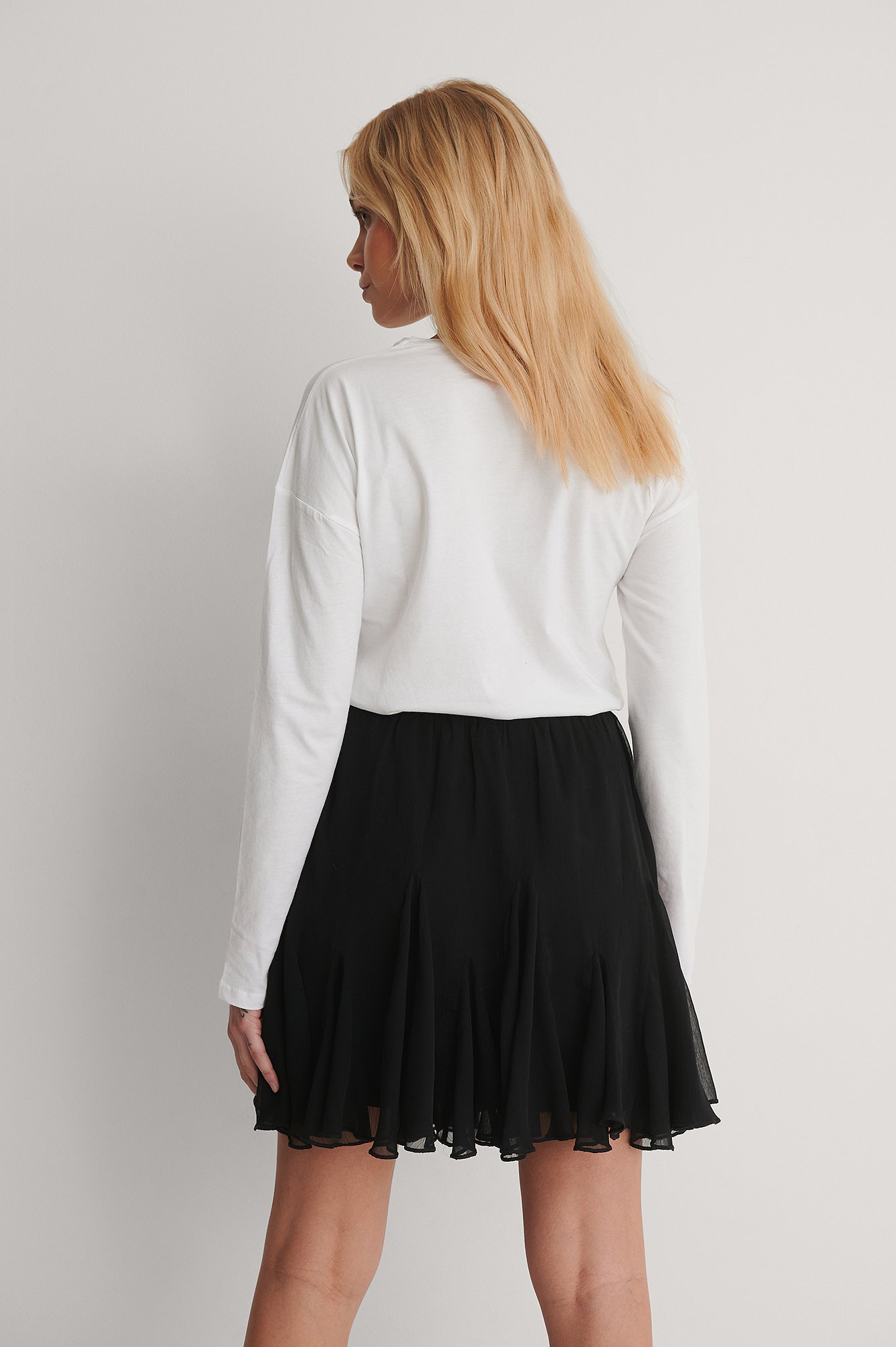 black flowy mini skirt