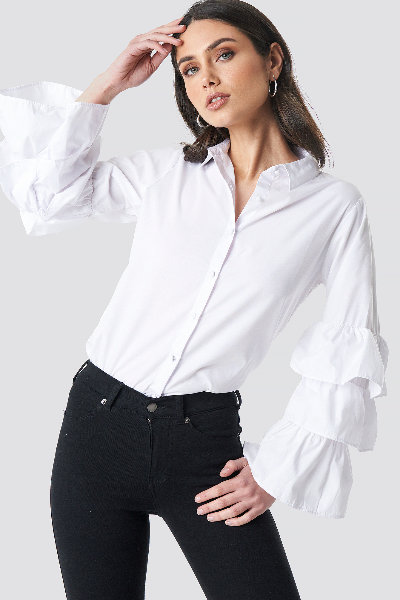 white shirt with frill sleeves