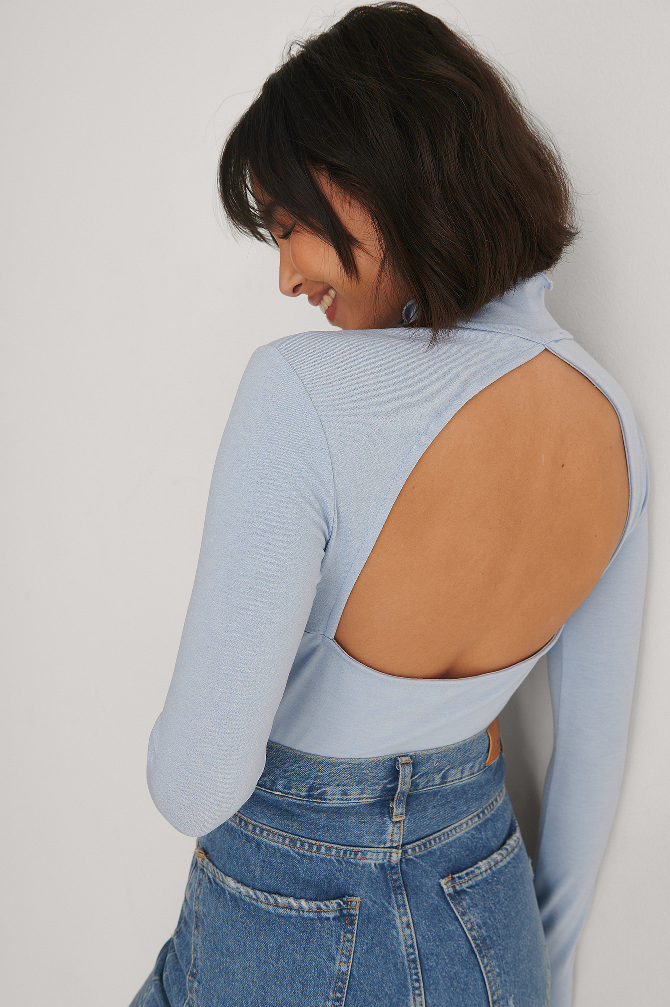 high neck open back top