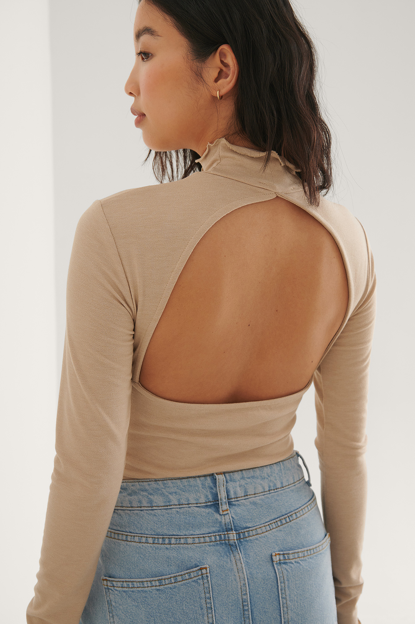high neck open back top