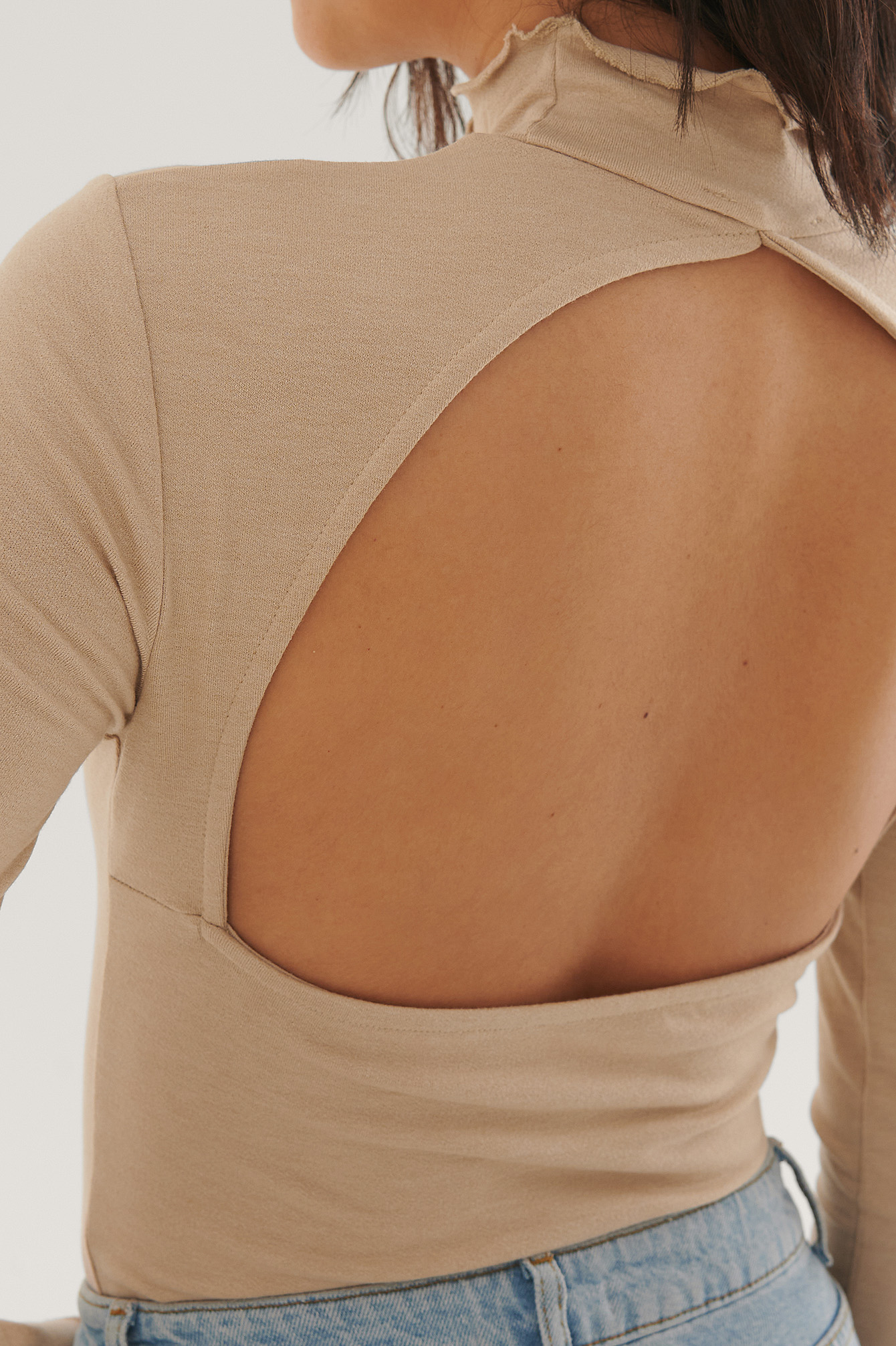 high neck open back top