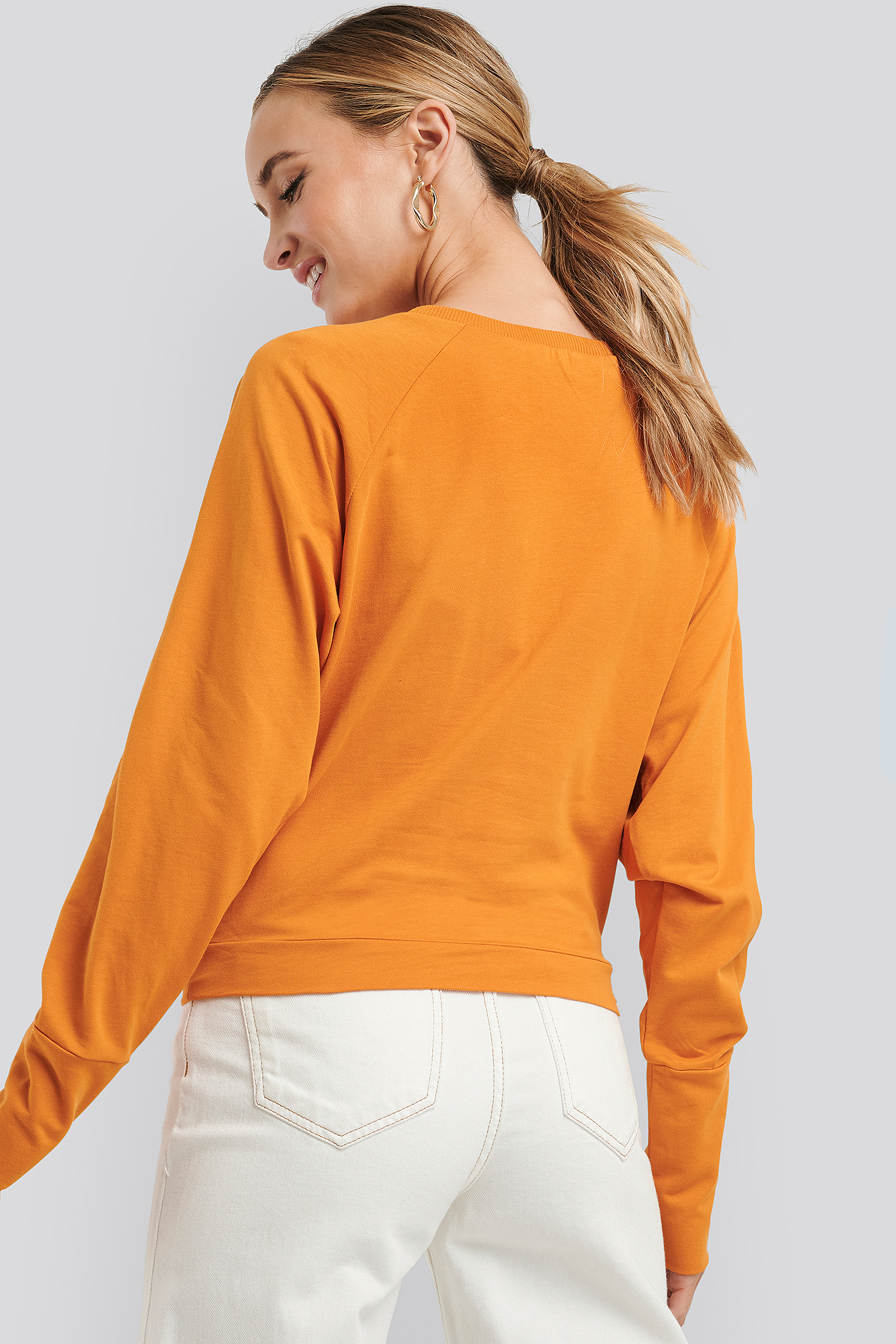 orange oversized sweater