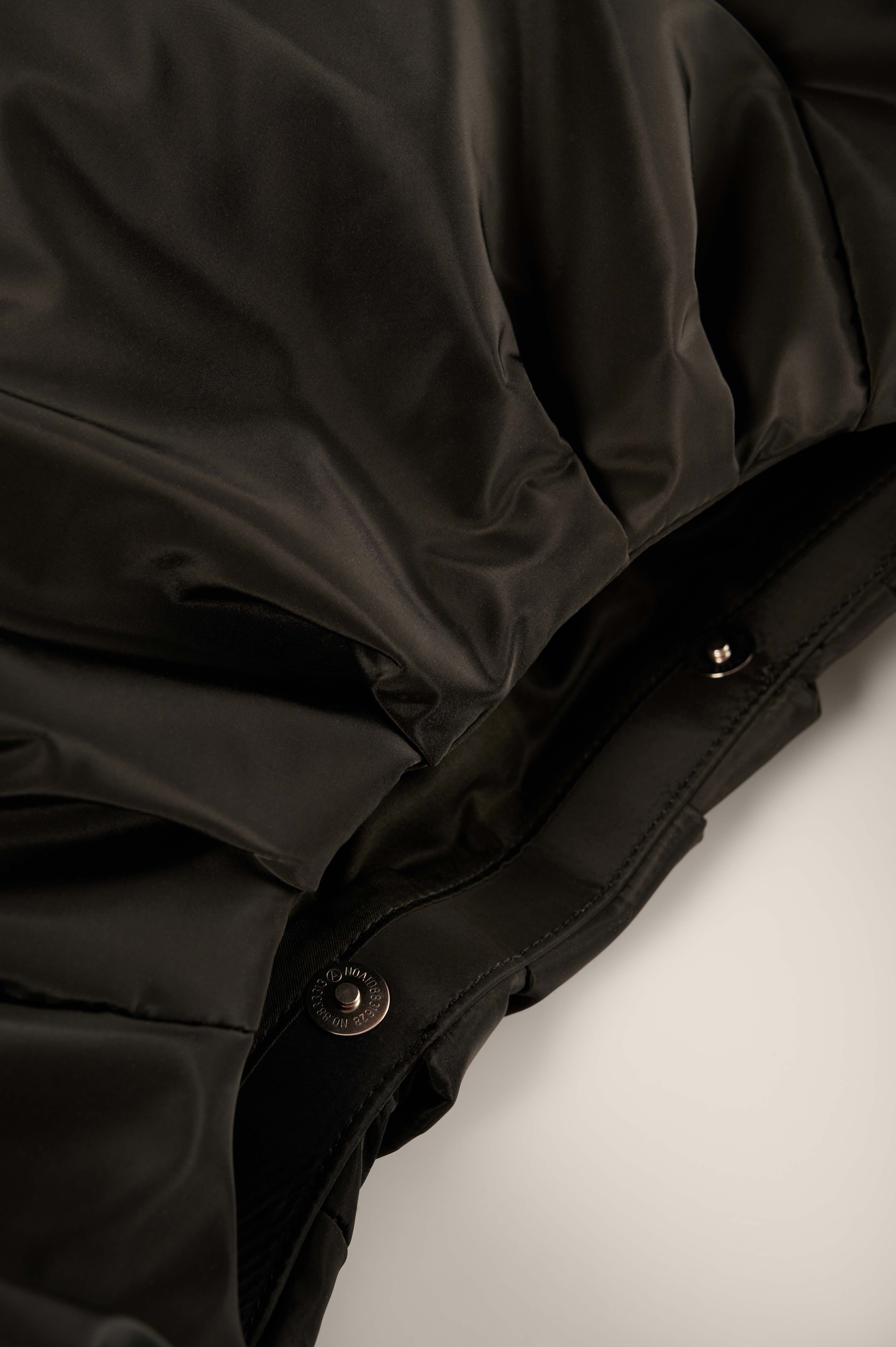 oversized black windbreaker