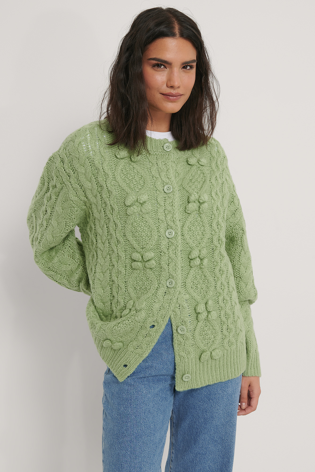 green knitted cardigan