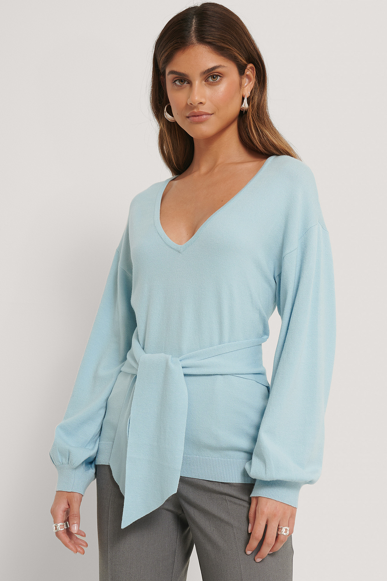 sweater with knot in front