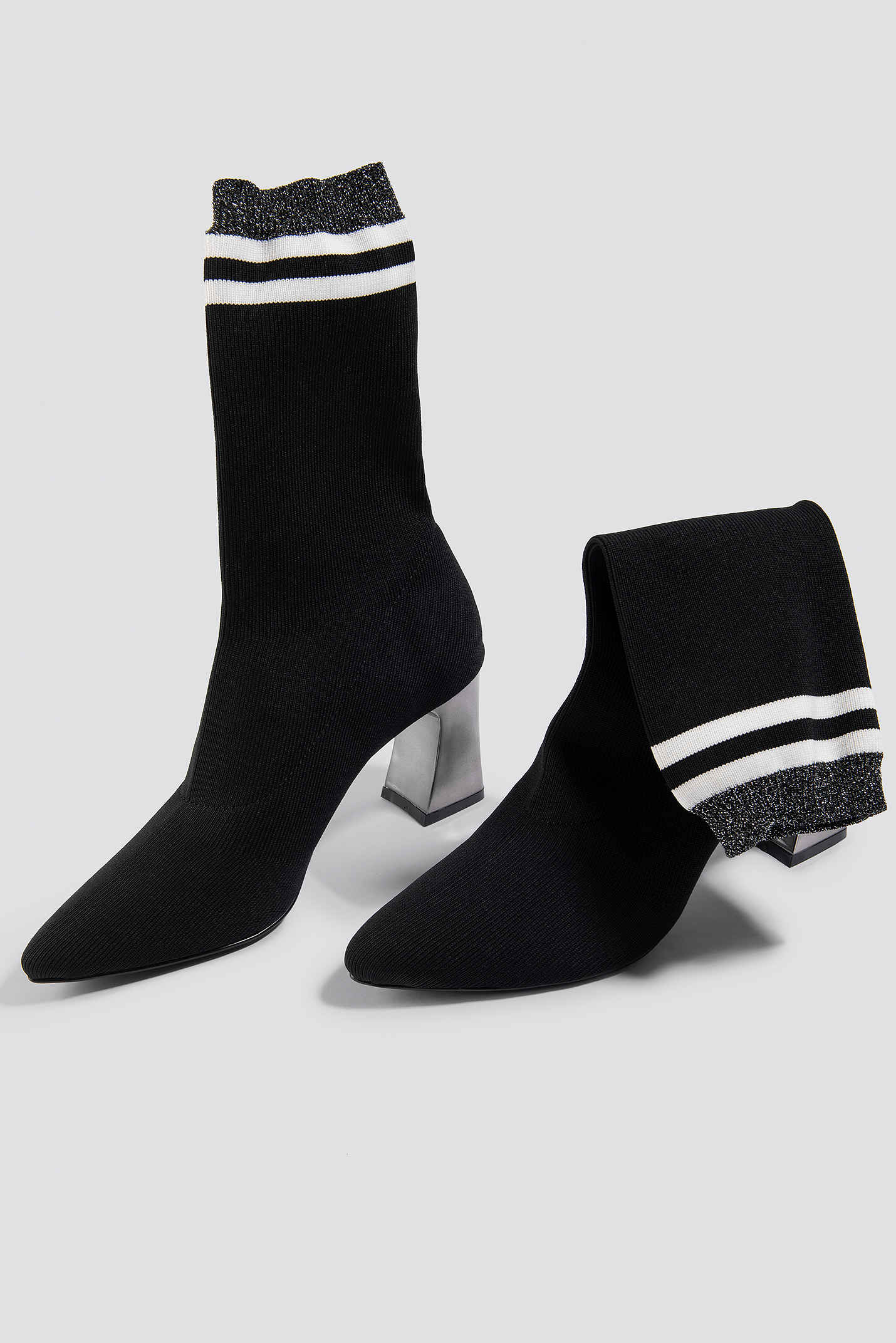black heeled sock boot