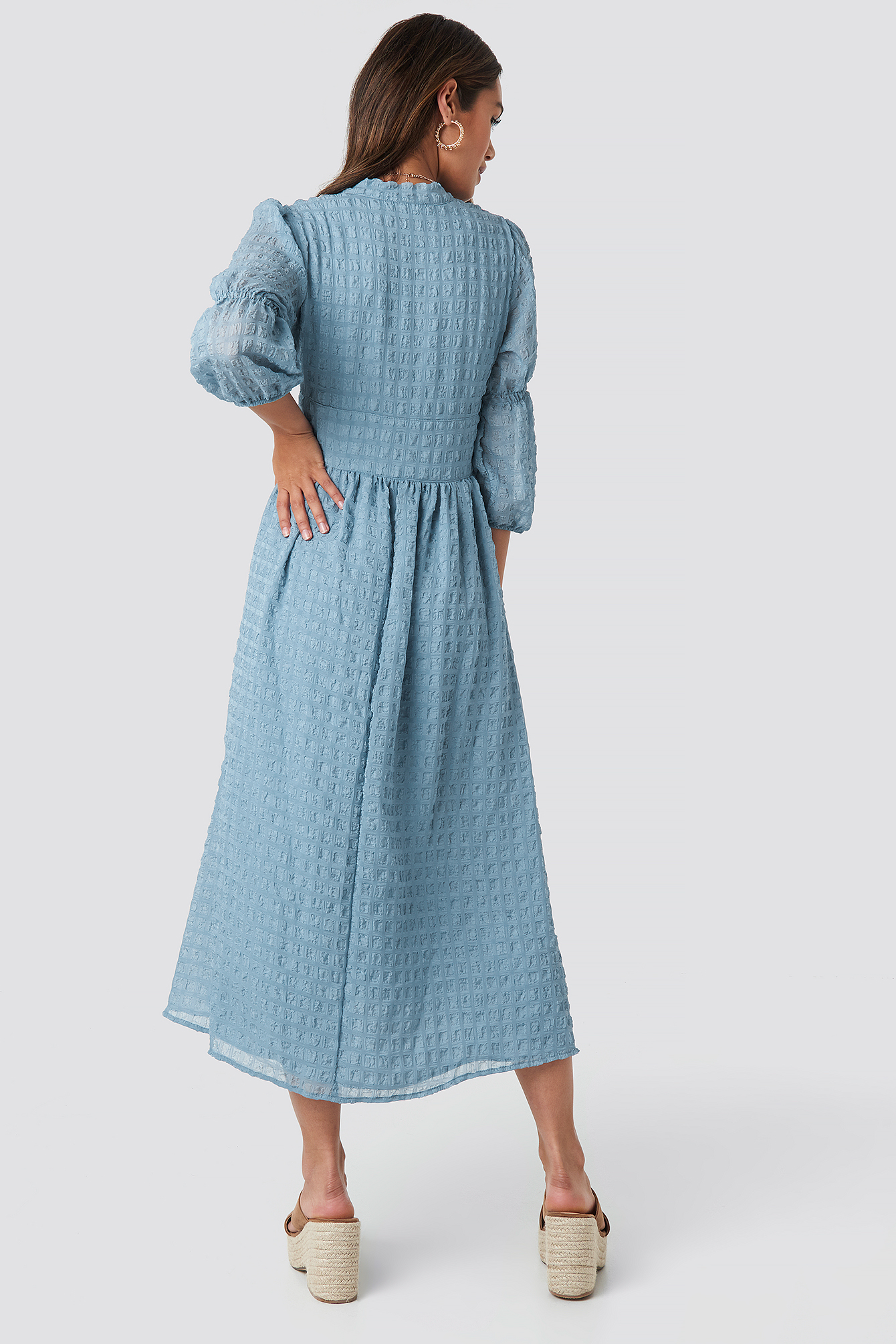 blue flowy dress with sleeves