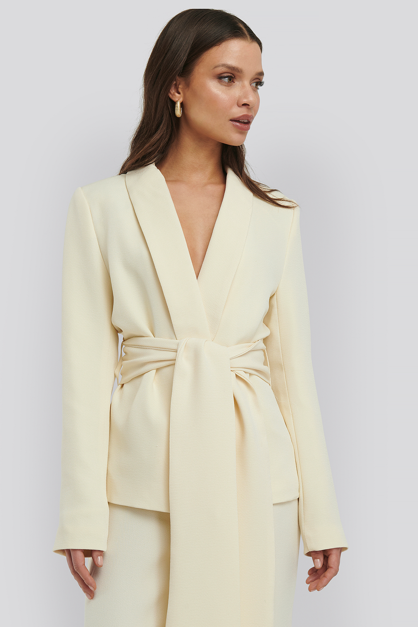cream belted blazer